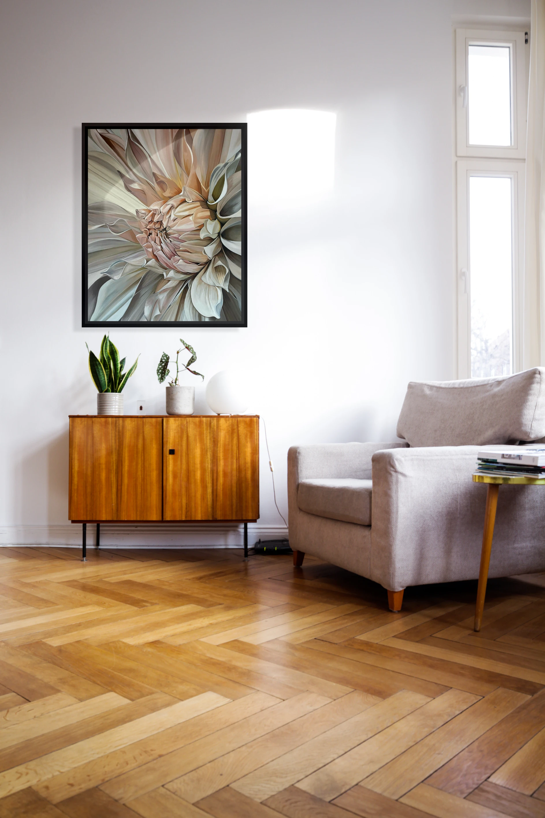 Living room with wooden floor, gray sofa, and decorative cabinet.
