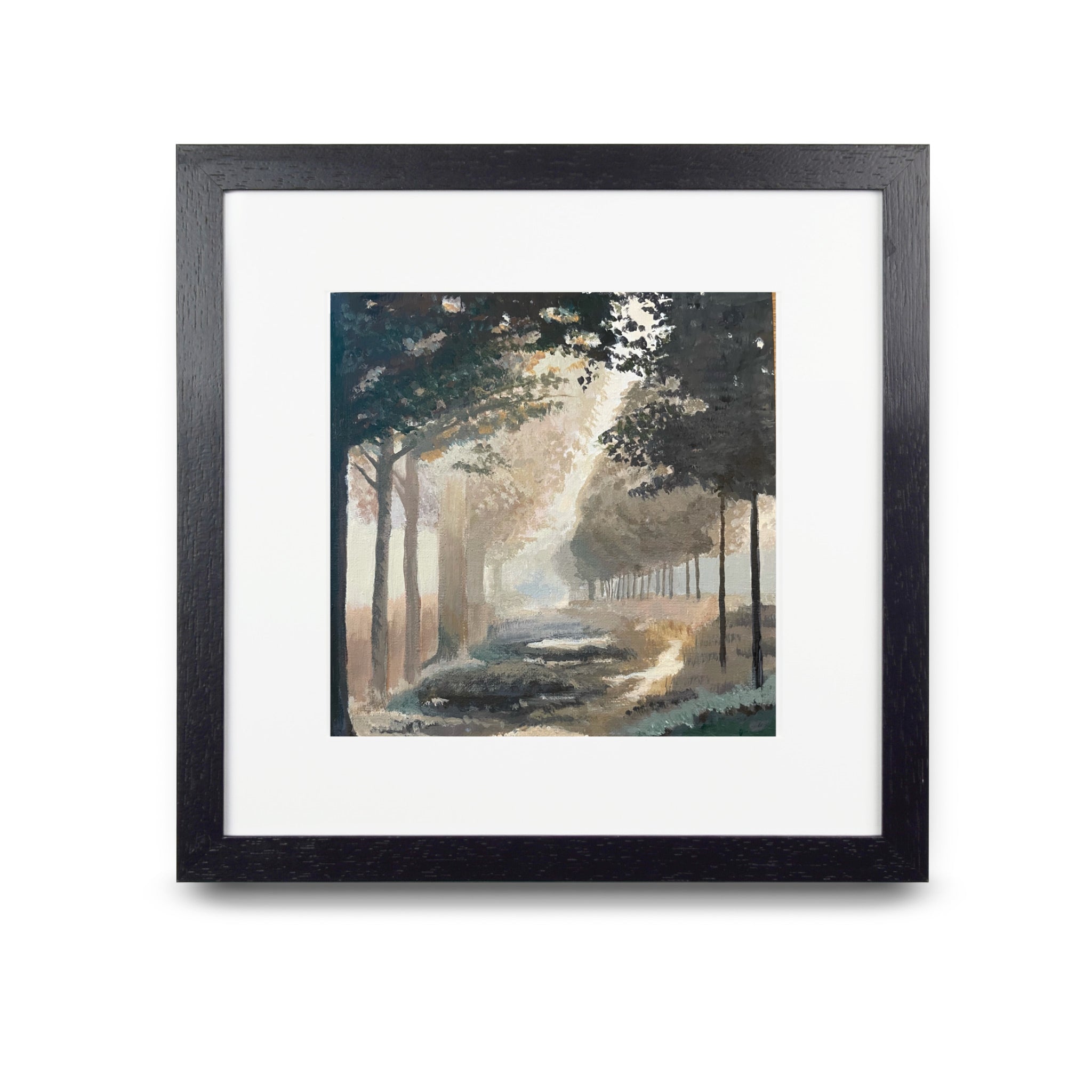 Framed artwork of a forest scene with sunlight filtering through the trees.