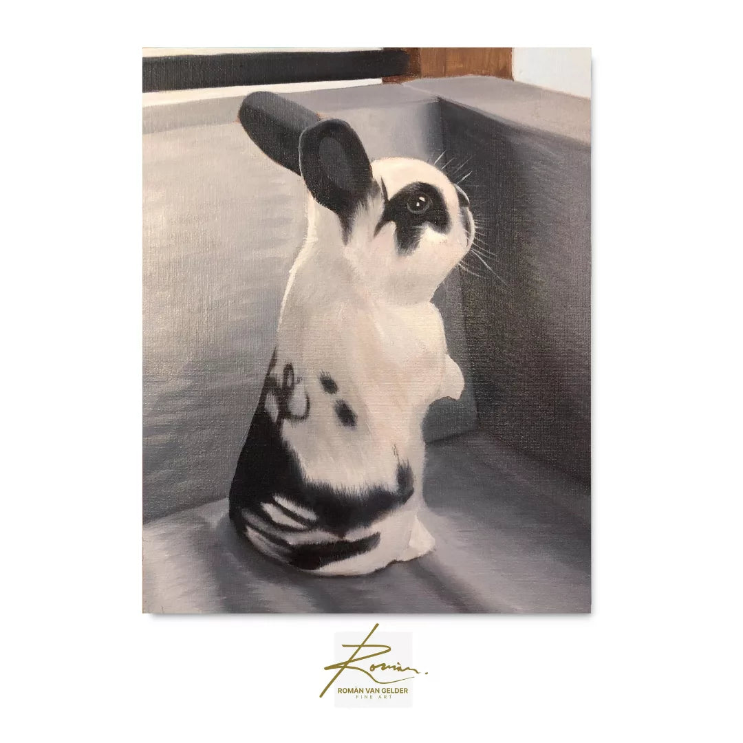 Black and white rabbit in a gray box with 'Roman' signature at the bottom.